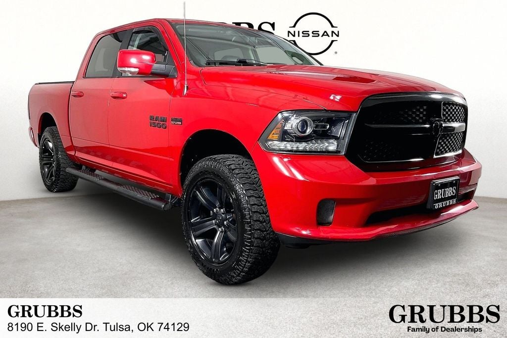 2018 RAM 1500 Night in Flame Red Clearcoat — front three-quarter view
