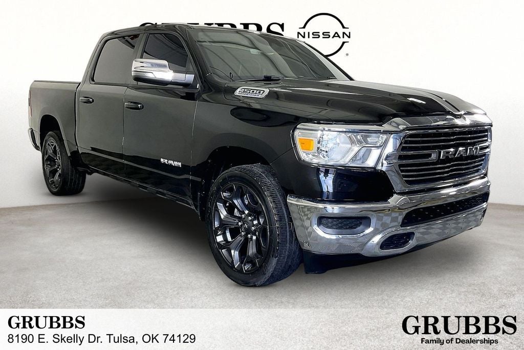 2024 RAM 1500 Laramie in Diamond Black Crystal Pearlcoat — front three-quarter view