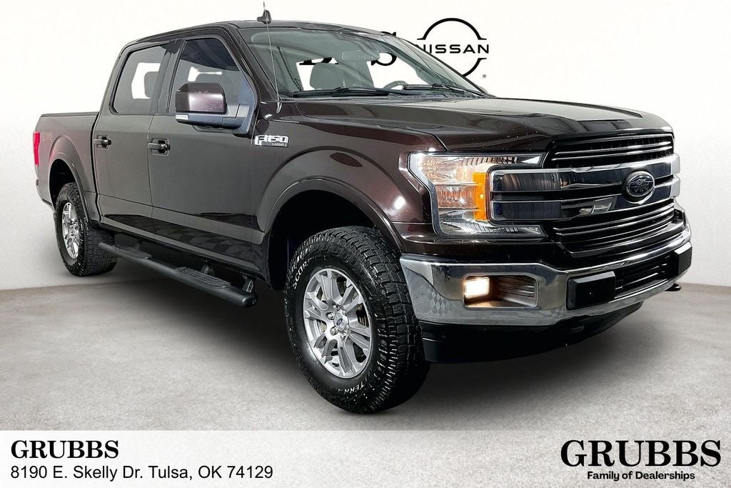 2020 Ford F-150 Lariat in Magma Red — front three-quarter view