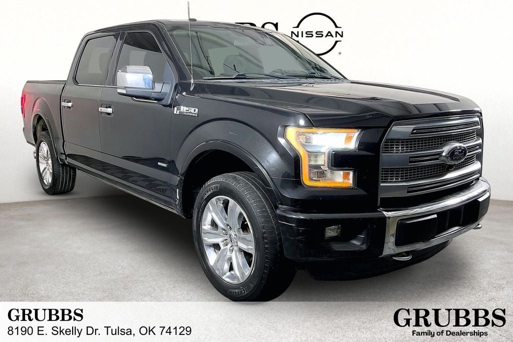 2015 Ford F-150 Platinum in Tuxedo Black Metallic — front three-quarter view