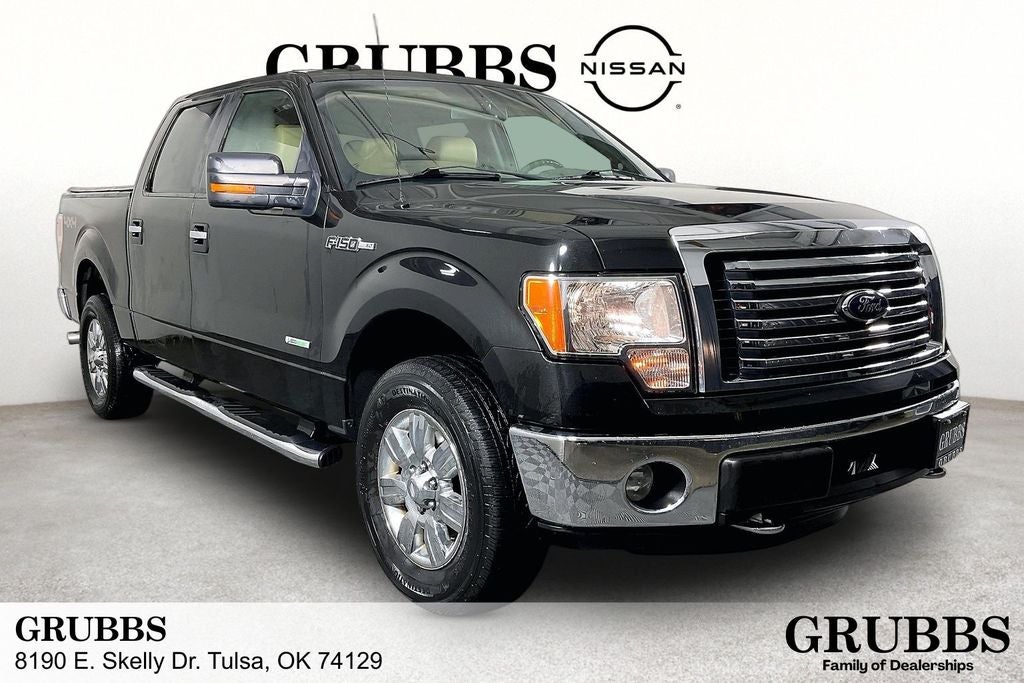 2012 Ford F-150 XLT in Tuxedo Black Metallic — front three-quarter view