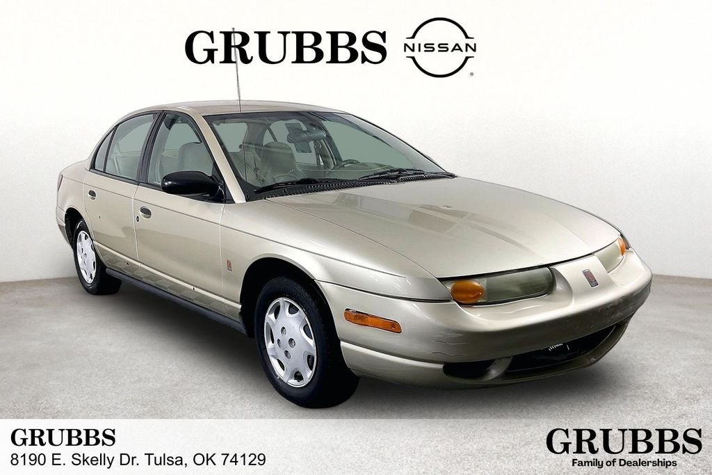 2002 Saturn SL1 Base in Gold — front three-quarter view