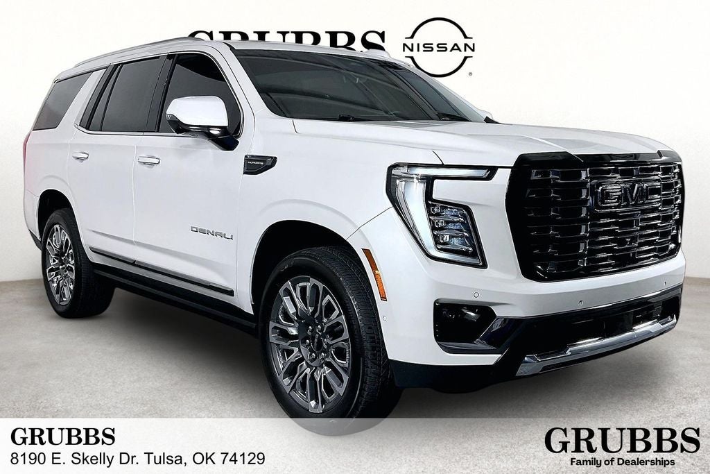 2025 GMC Yukon Denali Ultimate in White Frost Tricoat — front three-quarter view