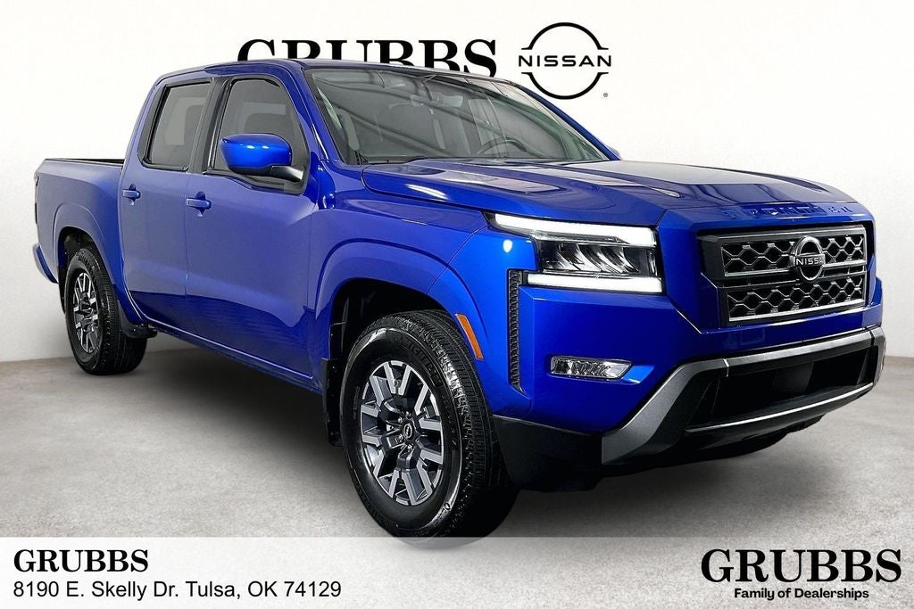 2024 Nissan Frontier SL in Bluestone Pearl — front three-quarter view