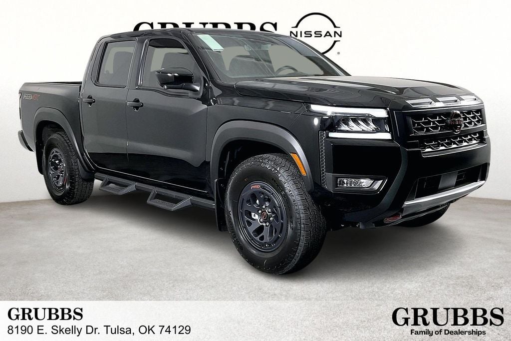 2026 Nissan Frontier Crew Cab PRO-4X in Super Black — front three-quarter view