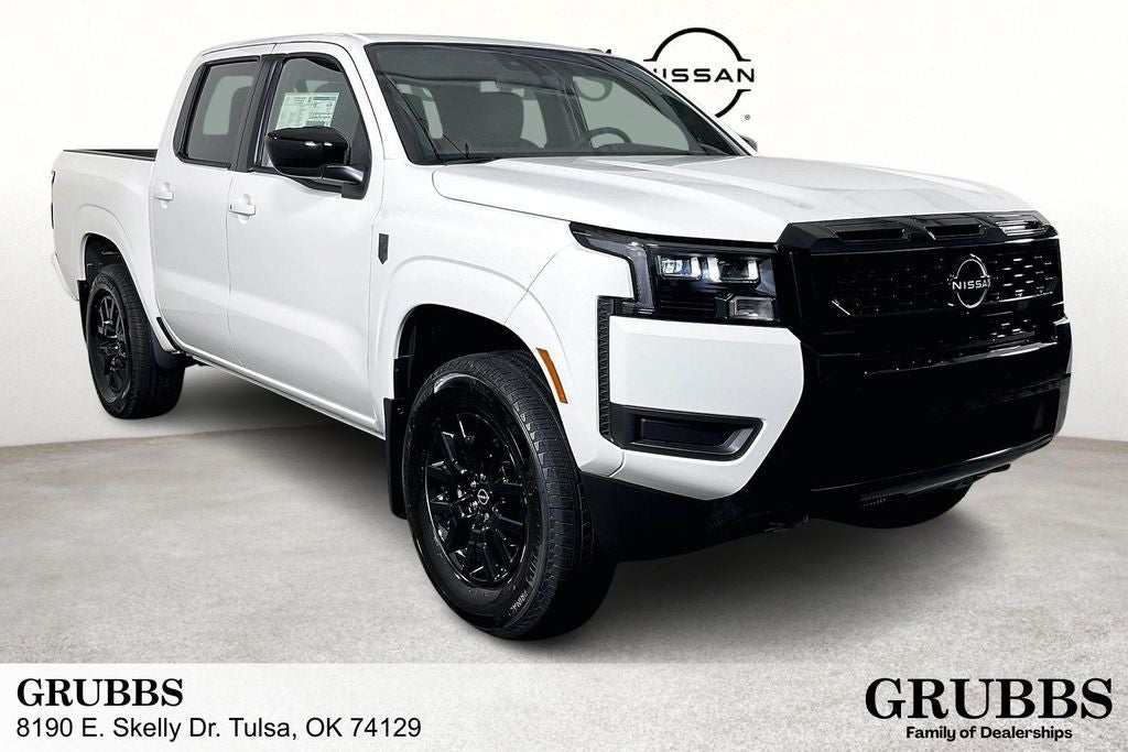 2026 Nissan Frontier Crew Cab SV in Glacier White — front three-quarter view