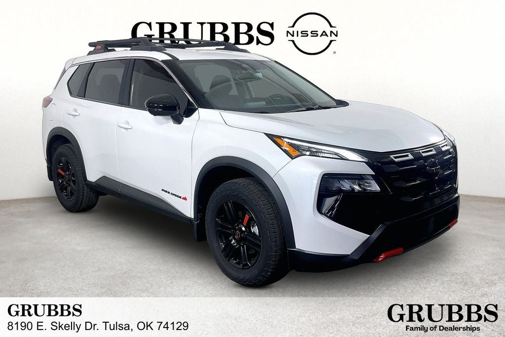 2026 Nissan Rogue Rock Creek in Everest White Pearl Tricoat — front three-quarter view