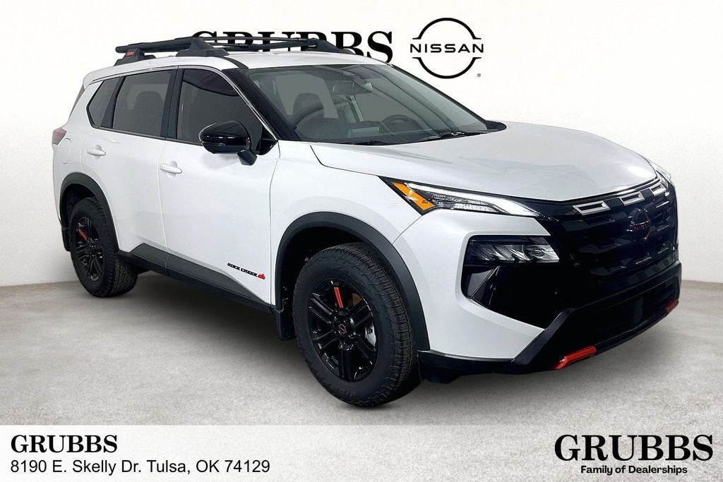 2026 Nissan Rogue Rock Creek in Everest White Pearl Tricoat — front three-quarter view