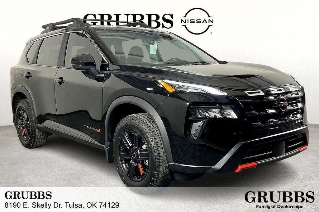 2026 Nissan Rogue Rock Creek in Super Black — front three-quarter view