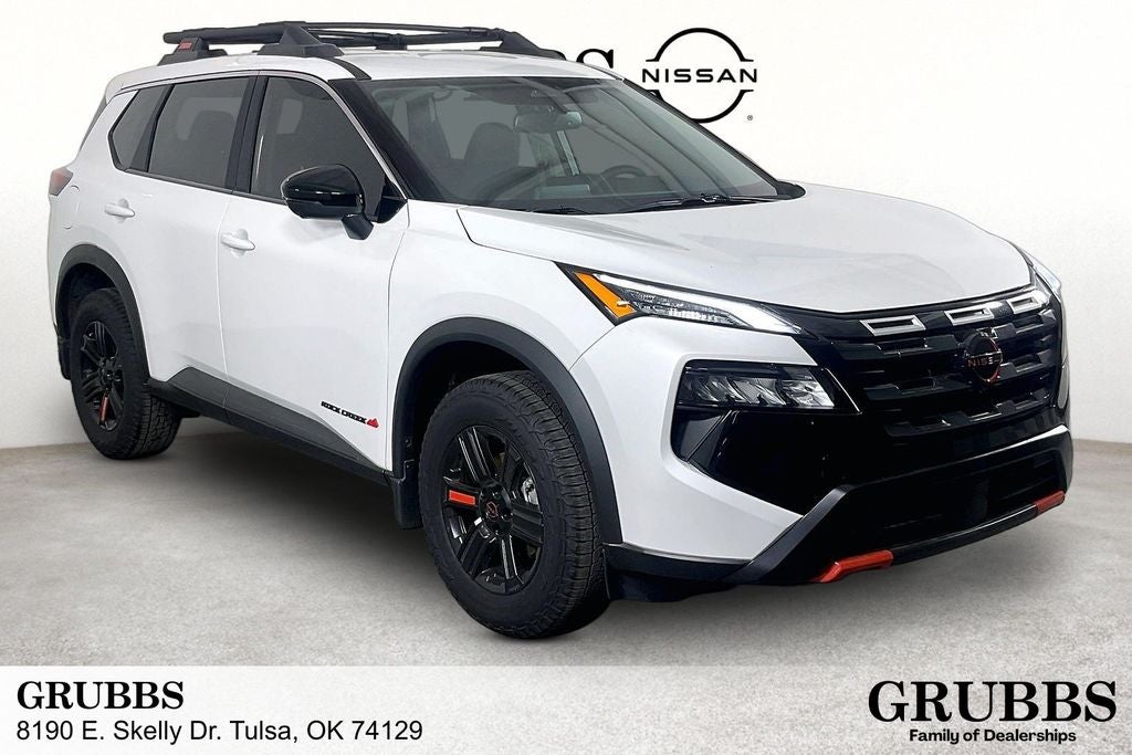 2026 Nissan Rogue Rock Creek in Everest White Pearl Tricoat — front three-quarter view