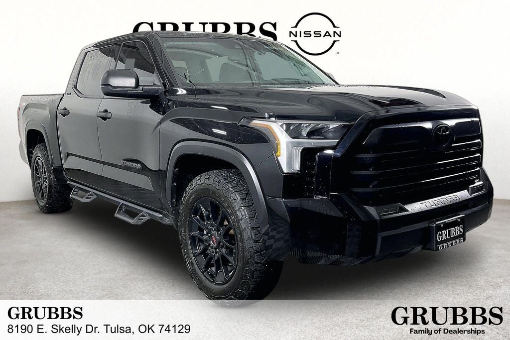 2023 Toyota Tundra SR5 in Midnight Black Metallic — front three-quarter view
