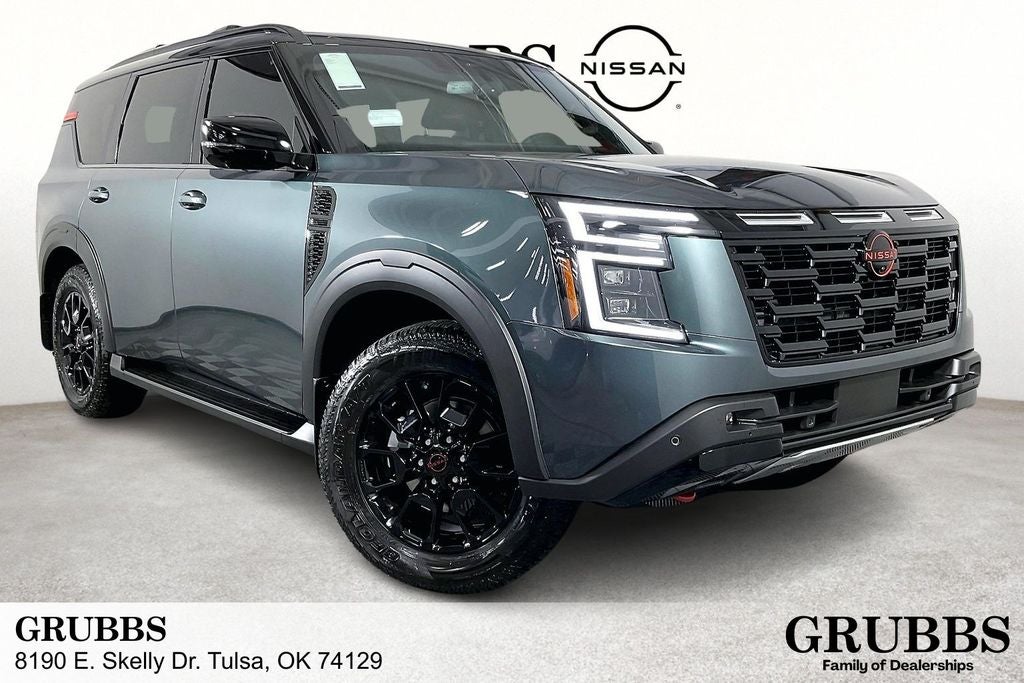 2026 Nissan Armada PRO-4X in Alpine Metallic/Super Blk — front three-quarter view